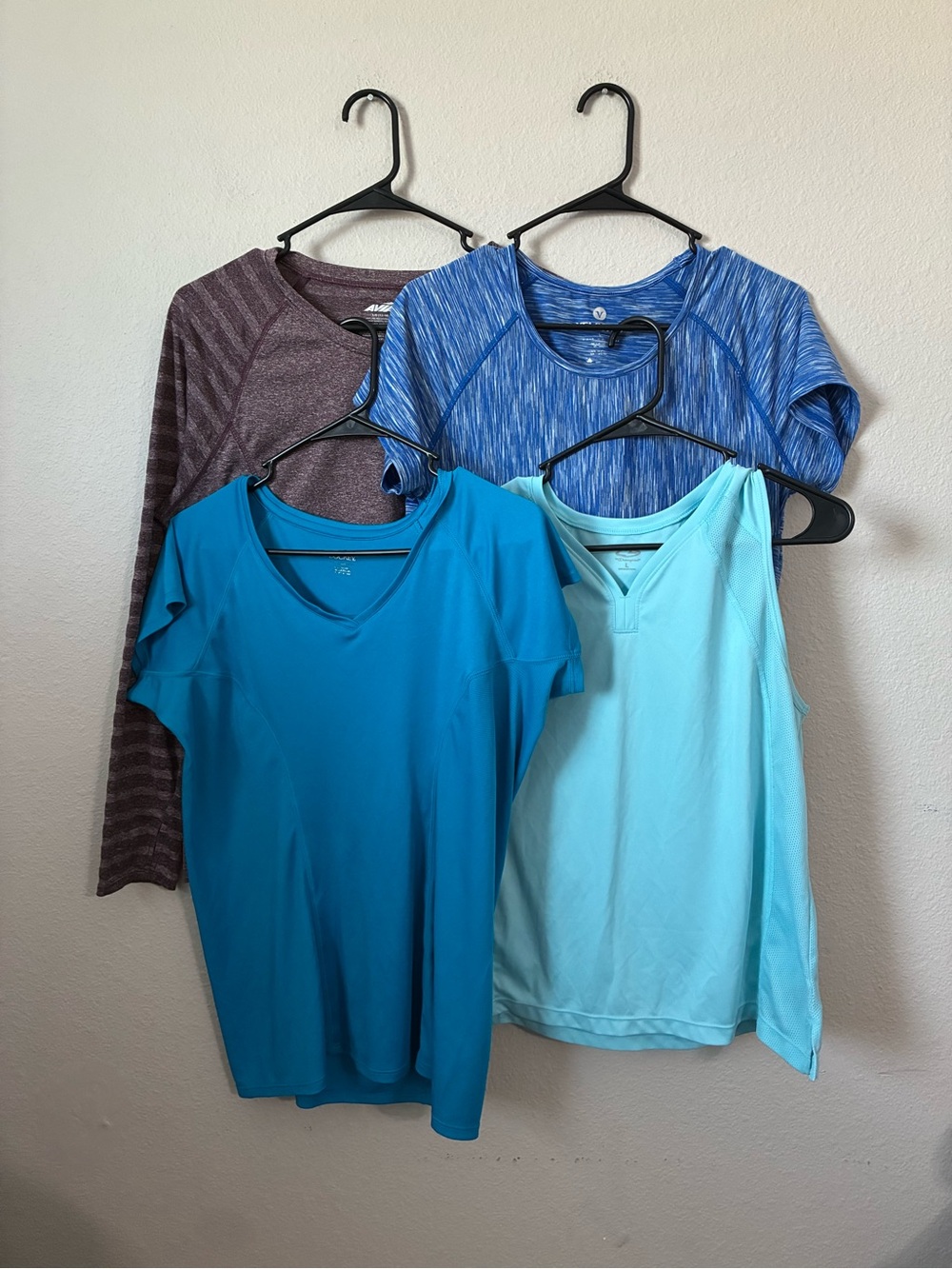 Assorted Women's Active Tops in Blue, Teal, Light Blue and Plum mixed brand